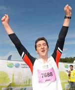 20 August 2011; Conor Mulhern, from Dublin, celebrates after finishing the National Lottery Frank Duffy 10 Mile race, Phoenix Park, Dublin. Picture credit: Pat Murphy / SPORTSFILE