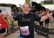 20 August 2011; Kevin Stanley, from Dublin, celebrates after finishing the National Lottery Frank Duffy 10 Mile race, Phoenix Park, Dublin. Picture credit: Pat Murphy / SPORTSFILE