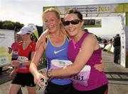 20 August 2011; Liza Hynes, from Meath, left, and Bridget Kelleher, from Dublin, celebrate after finishing the National Lottery Frank Duffy 10 Mile race, Phoenix Park, Dublin. Picture credit: Pat Murphy / SPORTSFILE
