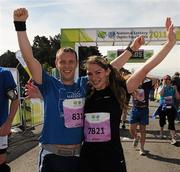 20 August 2011; Damien Kelly and Markella Tzirita, from Dublin, celebrate after finishing the National Lottery Frank Duffy 10 Mile race, Phoenix Park, Dublin. Picture credit: Pat Murphy / SPORTSFILE