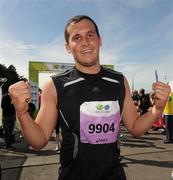 20 August 2011; James Mangan, from Dublin, celebrates after finishing the National Lottery Frank Duffy 10 Mile race, Phoenix Park, Dublin. Picture credit: Pat Murphy / SPORTSFILE
