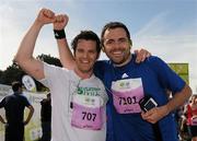 20 August 2011; Tony Salmon, from Wicklow, left, and Brian Mythen, from Dublin, celebrate after finishing the National Lottery Frank Duffy 10 Mile race, Phoenix Park, Dublin. Picture credit: Pat Murphy / SPORTSFILE