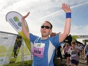 20 August 2011; Brian Murphy, from Dublin, celebrates after finishing the National Lottery Frank Duffy 10 Mile race, Phoenix Park, Dublin. Picture credit: Pat Murphy / SPORTSFILE