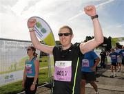 20 August 2011; Stephen Mahon, from Dublin, celebrates after finishing the National Lottery Frank Duffy 10 Mile race, Phoenix Park, Dublin. Picture credit: Pat Murphy / SPORTSFILE