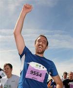 20 August 2011; Rob Pearson, from Dublin, celebrates after finishing the National Lottery Frank Duffy 10 Mile race, Phoenix Park, Dublin. Picture credit: Pat Murphy / SPORTSFILE