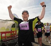 20 August 2011; Paul Leonard, from Louth, celebrates after finishing the National Lottery Frank Duffy 10 Mile race, Phoenix Park, Dublin. Picture credit: Pat Murphy / SPORTSFILE