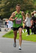 20 August 2011; Barry Minnock, from Rathfarnham, Dublin, in action during the National Lottery Frank Duffy 10 Mile race, Phoenix Park, Dublin. Picture credit: Pat Murphy / SPORTSFILE