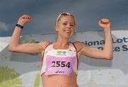 20 August 2011; Gemma Marie Steel, from England, after winning the Women's Frank Duffy 10 Mile race, Phoenix Park, Dublin. Picture credit: Pat Murphy / SPORTSFILE