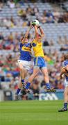 21 August 2011; Colin O'Riordan, Tipperary, in action against Enda Smith, Roscommon. GAA Football All-Ireland Minor Championship Semi-Final, Roscommon v Tipperary, Croke Park, Dublin. Picture credit: Ray McManus / SPORTSFILE