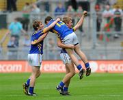 21 August 2011; Tipperary players Greg Henry, left, and John McGrath, lift team captain Liam McGrath off the field after the game. GAA Football All-Ireland Minor Championship Semi-Final, Roscommon v Tipperary, Croke Park, Dublin. Picture credit: Dáire Brennan / SPORTSFILE