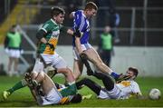 15 March 2017; Colm Murphy of Laois scores a goal despite the best efforts of the Offaly goalkeeper Barry Ronan and defenders Paddy Dunican and Colm Doyle during the EirGrid Leinster GAA Football U21 Championship Semi-Final match between Offaly and Laois at Netwatch Cullen Park in Carlow. Photo by Matt Browne/Sportsfile
