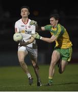 15 March 2017; Ben O'Donnell of Tyrone in action against Michael Langan of Donegal during the EirGrid Ulster GAA Football U21 Championship Quarter-Final match between Tyrone and Donegal at Healy Park in Omagh, Co Tyrone. Photo by Philip Fitzpatrick/Sportsfile