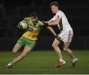 15 March 2017; Michael Carroll of Donegal in action against Fergal Meenagh of Tyrone during the EirGrid Ulster GAA Football U21 Championship Quarter-Final match between Tyrone and Donegal at Healy Park in Omagh, Co Tyrone. Photo by Philip Fitzpatrick/Sportsfile