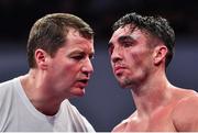 10 March 2017; Jamie Conlan receives instructions from his coach during his bout against Yarder Cardoza during their WBC International Silver super-flyweight bout in the Waterfront Hall in Belfast. Photo by Ramsey Cardy/Sportsfile