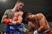 10 March 2017; Marco McCullough, left, in action against Leonel Hernandez during their featherweight bout in the Waterfront Hall in Belfast. Photo by Ramsey Cardy/Sportsfile