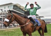 16 March 2017; Davy Russell celebrates after winning the Pertemps Network Final Handicap Hurdle on Presenting Percy during the Cheltenham Racing Festival at Prestbury Park in Cheltenham, England. Photo by Cody Glenn/Sportsfile