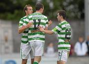 21 August 2011; Ciaran Kilduff, Shamrock Rovers, is congratulated after scoring his side's third goal by team-mates Karl Sheppard, left, and Karl Moore, right. Airtricity League Premier Division, Galway United v Shamrock Rovers, Terryland Park, Galway. Photo by Sportsfile
