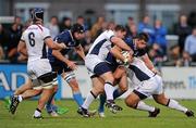 19 August 2011; Eamonn Sheridan, Leinster, is tackled by Ged Robinson, left, and Eddie Aholelei, Melbourne Rebels. Bank of Ireland Pre-season Series, Leinster v Melbourne Rebels, Donnybrook Stadium, Donnybrook, Dublin. Picture credit: Stephen McCarthy / SPORTSFILE