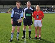 20 August 2011; Referee John Niland, with captains Cliodhna O'Connor, left, Dublin, and Amy O'Shea, Cork. TG4 All-Ireland Ladies Senior Football Championship Quarter-Final, Dublin v Cork, St Brendan's Park, Birr, Co. Offaly. Picture credit: David Maher / SPORTSFILE