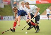 22 August 2011; Michael Darling, Ireland, in action against Tom Genester, France. GANT EuroHockey Nations Men's Championships 2011, Group B, Ireland v France. Warsteiner HockeyPark, Mönchengladbach, Germany. Picture credit: Diarmuid Greene / SPORTSFILE