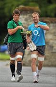 22 August 2011; Ireland's Donncha O'Callaghan, left, and Stephen Ferris, right, show off their new boots as they make their way to a squad training session ahead of their Rugby World Cup warm-up game against England on Saturday. Carton House, Maynooth, Co. Kildare. Picture credit: Barry Cregg / SPORTSFILE