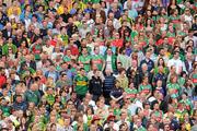 21 August 2011; Supporters of both teams stand for the playing of the National Anthem before the game. GAA Football All-Ireland Football Championship Semi-Finals. Croke Park, Dublin. Picture credit: Ray McManus / SPORTSFILE