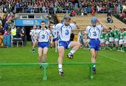 12 June 2011; The Waterford players make their way to the bench for the team photograph. Munster GAA Hurling Senior Championship Semi-Final, Limerick v Waterford, Semple Stadium, Thurles. Picture credit: Ray McManus / SPORTSFILE