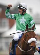 16 March 2017; Davy Russell celebrates winning the Pertemps Network Final Handicap Hurdle on Presenting Percy during the Cheltenham Racing Festival at Prestbury Park in Cheltenham, England. Photo by Cody Glenn/Sportsfile