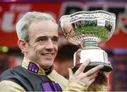 16 March 2017; Jockey Ruby Walsh celebrates with the trophy after winning the Sun Bets Stayers' Hurdle on Nichols Canyon during the Cheltenham Racing Festival at Prestbury Park in Cheltenham, England. Photo by Seb Daly/Sportsfile