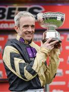 16 March 2017; Jockey Ruby Walsh celebrates with the trophy after winning the Sun Bets Stayers' Hurdle on Nichols Canyon during the Cheltenham Racing Festival at Prestbury Park in Cheltenham, England. Photo by Seb Daly/Sportsfile