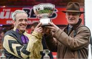 16 March 2017; Jockey Ruby Walsh, left, and trainer Willie Mullins celebrate with the trophy after winning the Sun Bets Stayers' Hurdle during the Cheltenham Racing Festival at Prestbury Park in Cheltenham, England. Photo by Seb Daly/Sportsfile