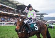 16 March 2017; Ruby Walsh holds up a number four after winning his fourth race of the day in the Trull House Stud Mares' Novices' Hurdle on Let's Dance during the Cheltenham Racing Festival at Prestbury Park in Cheltenham, England. Photo by Cody Glenn/Sportsfile