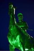 16 March 2017; A statue of 1986 Gold Cup-winner Dawn Run, trained by Paddy Mullins and ridden by Jonjo O'Neill, is illuminated green for St. Patrick's Day during the Cheltenham Racing Festival at Prestbury Park in Cheltenham, England. Photo by Cody Glenn/Sportsfile