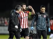 13 March 2017; Ryan McBride of Derry City comes off injured during the SSE Airtricity League Premier Division match between Derry City and Dundalk at Maginn Park in Buncrana, Donegal. Photo by Oliver McVeigh/Sportsfile