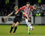 13 March 2017; Ronan Curtis of Derry City  in action against John Mountney of Dundalk during the SSE Airtricity League Premier Division match between Derry City and Dundalk at Maginn Park in Buncrana, Donegal. Photo by Oliver McVeigh/Sportsfile