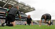 31 July 2011; Referee Pat McEnaney, centre, along with linesmen Eddie Kinsella, left, and Padraig Hughes, right, during their warm up. GAA Football All-Ireland Senior Championship Quarter-Final, Kerry v Limerick, Croke Park, Dublin. Picture credit: Oliver McVeigh / SPORTSFILE