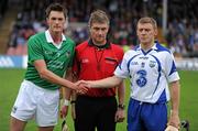 12 June 2011; Limerick captain Gavin O'Mahony, left, and Waterford captain Stephen Molumphy shake hands in front of referee Barry Kelly before the game. Munster GAA Hurling Senior Championship Semi-Final, Limerick v Waterford, Semple Stadium, Thurles. Picture credit: Ray McManus / SPORTSFILE