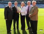 24 August 2011; Donegal’s Brian McEniff who was inducted into the MBNA Kick Fada Hall of Fame is presented with his award by Suzanne Holmes, Communications Director with MBNA, also pictured are from left fellow recipients, Paddy Doherty, Donie O'Sullivan and Peter Nolan, Croke Park, Dublin. Picture credit: Matt Browne / SPORTSFILE