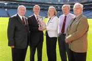 24 August 2011; Donegal’s Brian McEniff who was inducted into the MBNA Kick Fada Hall of Fame is presented with his award by Suzanne Holmes, Communications Director with MBNA, also pictured are from left fellow recipients, Paddy Doherty, Donie O'Sullivan and Peter Nolan, Croke Park, Dublin. Picture credit: Matt Browne / SPORTSFILE