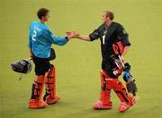 24 August 2011; Ireland goalkeeper David Harte, right, and Netherlands goalkeeper Jaap Stockmann exchange a handshake after the game after conceding 11 goals between them during the game. GANT EuroHockey Nations Men's Championships 2011, Ireland v Netherlands, Warsteiner HockeyPark, Mönchengladbach, Germany. Picture credit: Diarmuid Greene / SPORTSFILE