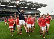17 March 2017; Seán Brennan of Cuala and his team-mates celebrate with the Tommy Moore Cup after the AIB GAA Hurling All-Ireland Senior Club Championship Final match between Ballyea and Cuala at Croke Park in Dublin. Photo by Brendan Moran/Sportsfile