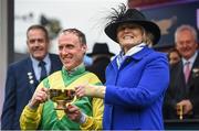 17 March 2017; Jockey Robbie Power and trainer Jessica Harrington with the Gold Cup after winning the Timico Cheltenham Gold Cup Steeple Chase on Sizing John during the Cheltenham Racing Festival at Prestbury Park in Cheltenham, England. Photo by Cody Glenn/Sportsfile