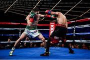 17 March 2017; Michael Conlan, left, in action against Tim Ibarra in their featherweight bout at The Theater in Madison Square Garden in New York, USA. Photo by Ramsey Cardy/Sportsfile