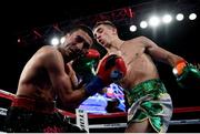 17 March 2017; Michael Conlan, right, lands a right punch on Tim Ibarra which led to the stoppage of their featherweight bout at The Theater in Madison Square Garden in New York, USA. Photo by Ramsey Cardy/Sportsfile
