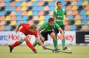 26 August 2011; John Jermyn, Ireland, in action against Dmitry Volkov, Russia. Ireland v Russia - GANT EuroHockey Nations Men's Championships 2011. Warsteiner HockeyPark, Mönchengladbach, Germany. Picture credit: Diarmuid Greene / SPORTSFILE