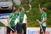 26 August 2011; David Ames, Ireland, centre, celebrates with team-mates Christopher Cargo, left, and Timothy Cockram, after scoring his side's fourth goal. Ireland v Russia - GANT EuroHockey Nations Men's Championships 2011. Warsteiner HockeyPark, Mönchengladbach, Germany. Picture credit: Diarmuid Greene / SPORTSFILE