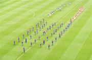 21 August 2011; The Kerry and Mayo teams follow the Artane School of Music Band during the pre-match parade. GAA Football All-Ireland Senior Championship Semi-Final, Mayo v Kerry, Croke Park, Dublin. Picture credit: Dáire Brennan / SPORTSFILE