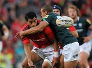 26 August 2011; Lifeimi Mafi, Munster, is tackled by Jonathan Joseph, London Irish. Pre-season Friendly, Munster v London Irish, Thomond Park, Limerick. Picture credit: Matt Browne / SPORTSFILE