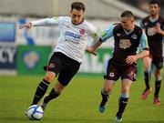 26 August 2011; Mark Quigley, Dundalk, in action against Philip Hand, Drogheda United. FAI Ford Cup Fourth Round, Drogheda United v Dundalk, Hunky Dory Park, Drogheda, Co. Louth. Picture credit: Oliver McVeigh / SPORTSFILE