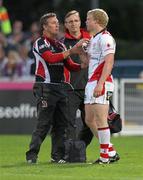 26 August 2011; Nevin Spence, Ulster, is treated by Alan McCaldin, and Dr. David Irwin. Pre-Season Friendly, Ulster v Harlequins, Ravenhill Park, Belfast, Co. Antrim. Picture credit: John Dickson / SPORTSFILE
